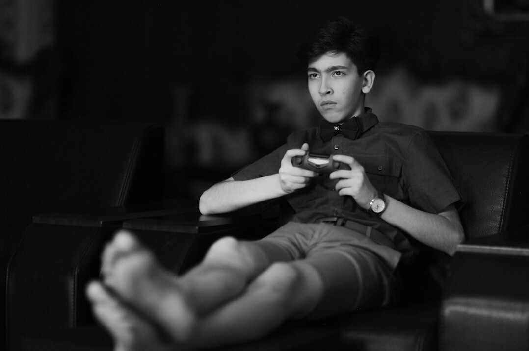 Portrait of a young Latin American football star in training gear