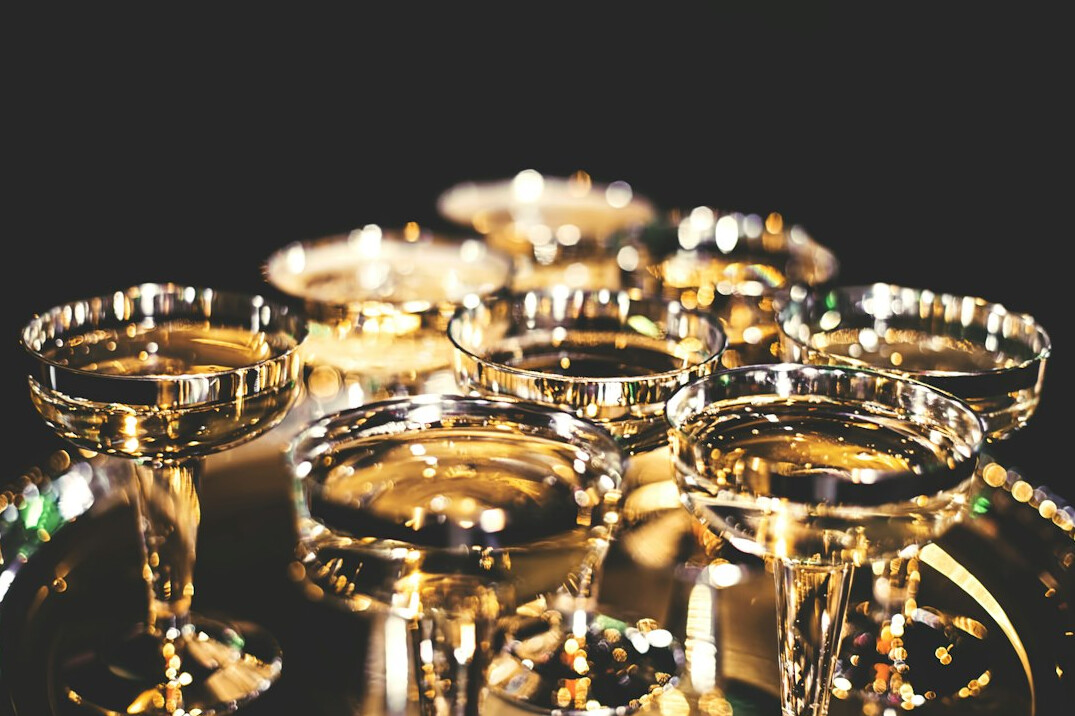 Champagne glasses toasting at a glamorous party